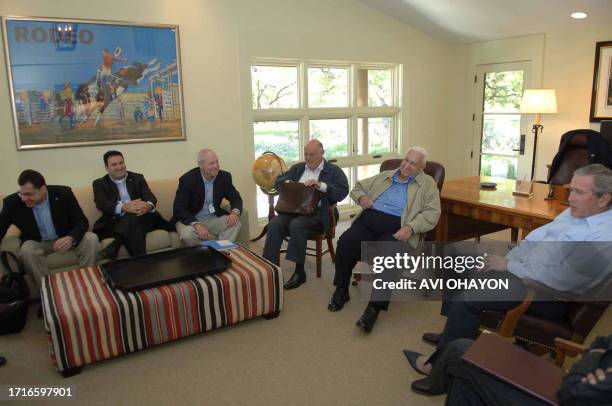 Picture released by the Israeli Government Press Office shows Israeli Premier Ariel Sharon smiling during a meeting with US President George W. Bush...