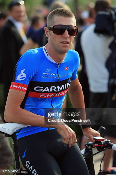 Ryder Hesjedal of Canada riding for Garmin Sharp looks on as he prepares for the teams presentation for the 100th Tour de France on June 27, 2013 in...