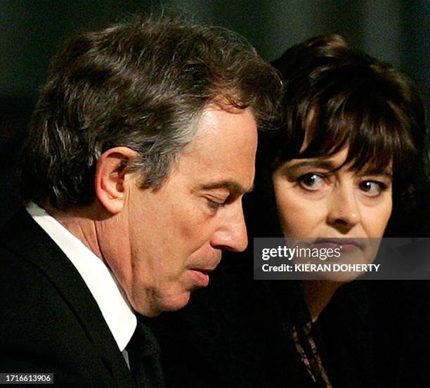 British Prime Minister Tony Blair and his wife Cherie attend a memorial Mass for Pope John Paul II at Westminster Cathedral in London 04 April, 2005....