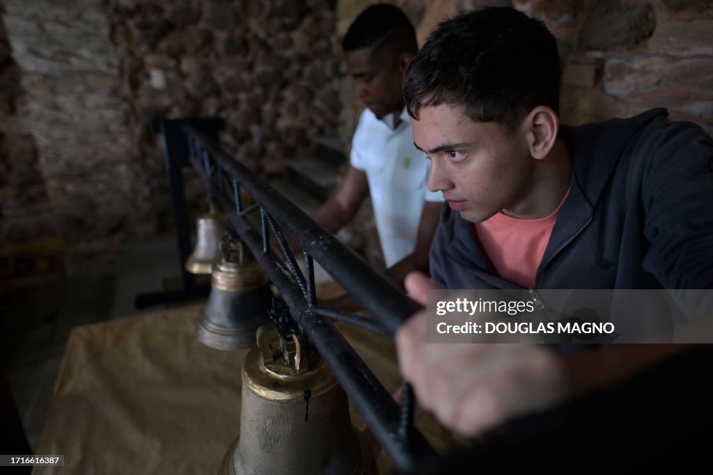 Agressive Bell Ringer Students participate in a class at the School of Bell Ringers at Casa ...