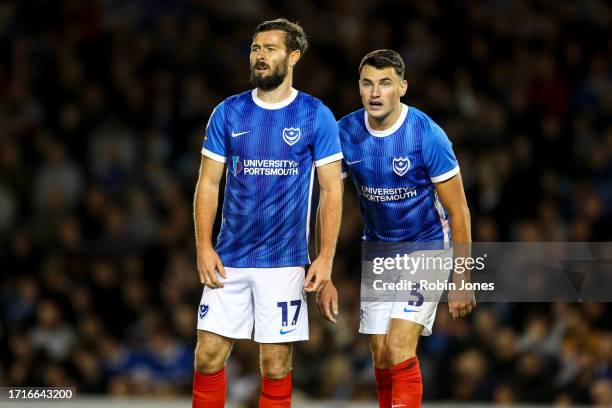 Joe Rafferty and Regan Poole of Portsmouth FC during the Sky Bet League One match between Portsmouth and Wycombe Wanderers at Fratton Park on October...