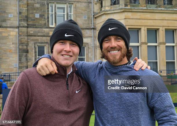 Robert MacIntyre of Scotland and Tommy Fleetwood of England pose for a photograph on the first tee in front of the Royal and Ancient Golf Club of St...
