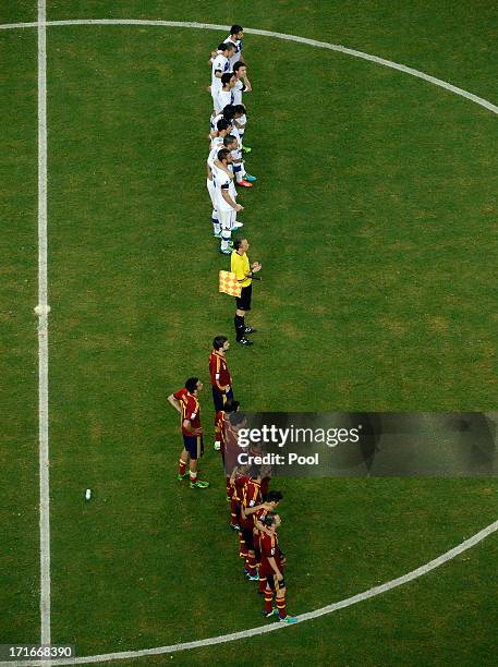The Spain and Italy players watch the penalty shootout during the FIFA Confederations Cup Brazil 2013 Semi Final match between Spain and Italy at...