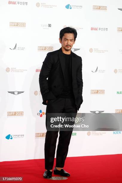 John Cho arrives for the Opening Ceremony of the 28th Busan International Film Festival at Busan Cinema Center on October 04, 2023 in Busan, South...