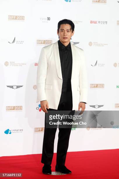 Teo Yoo arrives for the Opening Ceremony of the 28th Busan International Film Festival at Busan Cinema Center on October 04, 2023 in Busan, South...