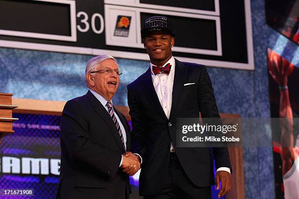 Ben McLemore of Kansas poses for a photo with NBA Commissioner David Stern after McLemore was drafted overall in the first round by the Sacramento...