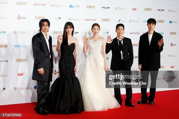 Park Yu-rim, Jun Jong-eo and Lee Chung Hyeon arrive for the Opening Ceremony of the 28th Busan International Film Festival at Busan Cinema Center on...