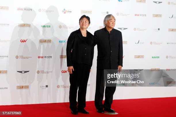 Paik Kun-woo and Paik Jin-hee arrive for the Opening Ceremony of the 28th Busan International Film Festival at Busan Cinema Center on October 04,...