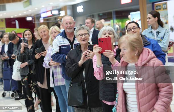 Well-wishers wait to see Catherine, Princess of Wales during her visit to Vsi Razom Community Hub, in the Lexicon Shopping Centre, on October 04,...