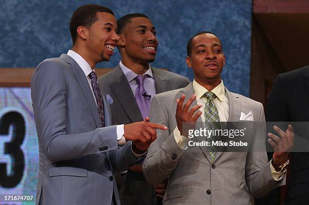 Michael Carter-Williams of Syracuse, Otto Porter of Georgetown and C.J. McCollum of Lehigh share a laugh on stage prior to the start of the 2013 NBA...