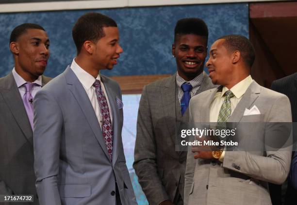 Otto Porter of Georgetown, Michael Carter-Williams of Syracuse, Nerlens Noel of Kentucky and C.J. McCollum of Lehigh share a laugh on stage prior to...