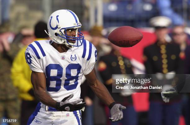 Receiver Marvin Harrison of the Indianapolis Colts has trouble catching the ball against the Tennessee Titans during their game on December 8, 2002...