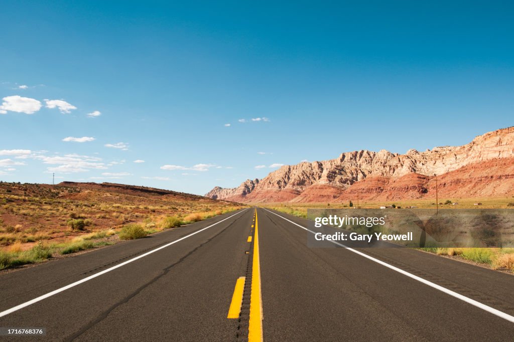Desert road leading into the distance