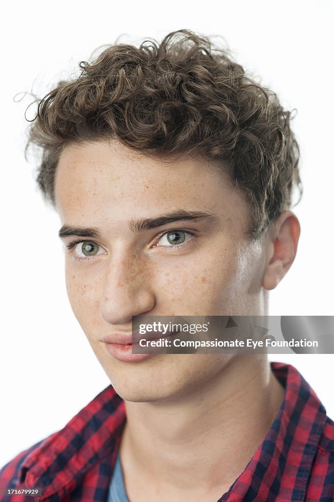 Close up portrait of smiling young man