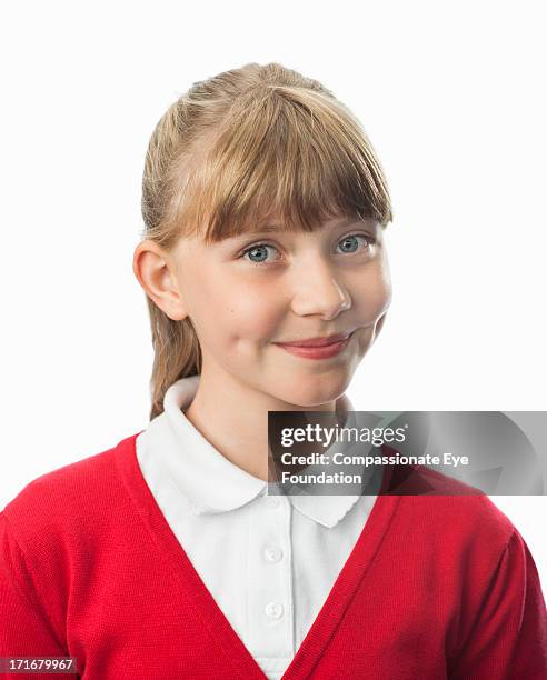 close up portrait of smiling school girl (10-12) - grübchen stock-fotos und bilder