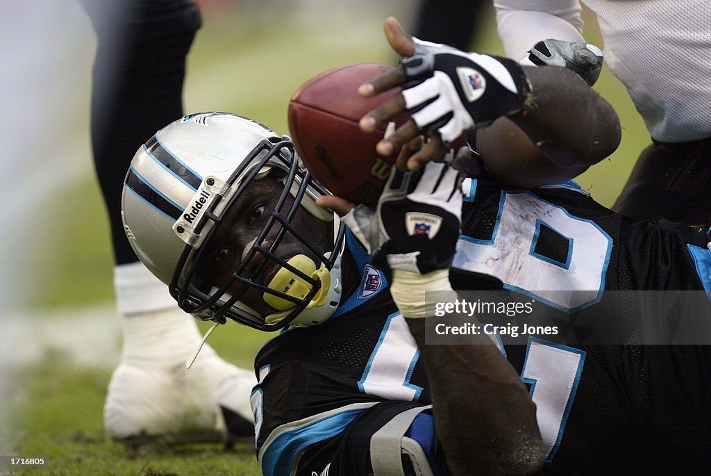 Running Back Lamar Smith of the Carolina Panthers holds onto the ball