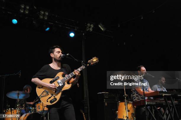 Taylor Rice and Kelsey Ayer of Local Natives perform on stage at Field Day Festival at Victoria Park on May 25, 2013 in London, England.