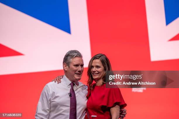 Sir Keir Starmer, leader of the Labour Party with his wife Lady Victoria Starmer after giving his key note speech to delegates on third day of the...