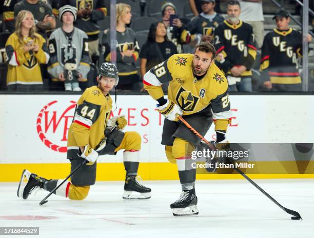 Layton Ahac and William Carrier of the Vegas Golden Knights warm up before a preseason game against the San Jose Sharks at T-Mobile Arena on October...