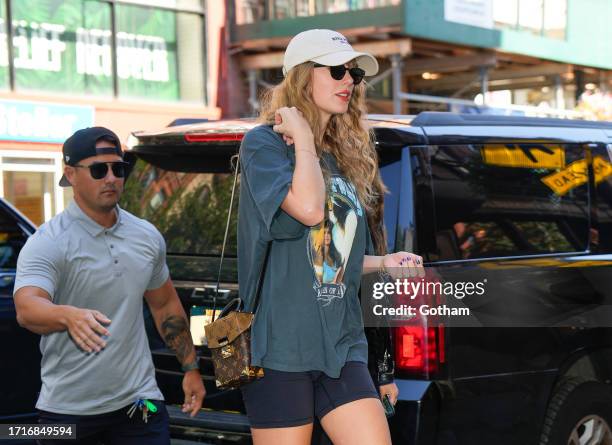 Taylor Swift and Keleigh Teller arrive at the studio on October 03, 2023 in New York City.