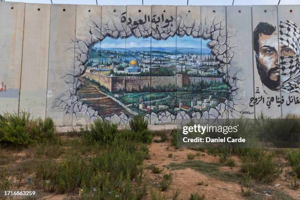 Mural showing the Al-Aqsa Mosque in Jerusalem on the wall marking the Lebanon-Israel border along the Blue Line on October 10, 2023 in Odaisseh,...