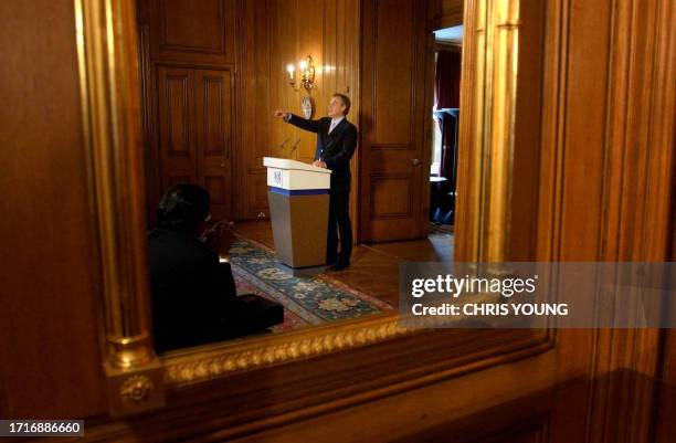British Prime Minister Tony Blair takes addresses journalists during his monthly press conference at Downing Street, 26 July 2005. Blair said he...