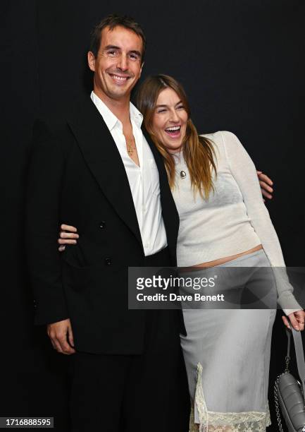 Francois Larpin and Camille Charriere attend the Gucci Cosmos evening Vernissage at 180 The Strand on October 10, 2023 in London, England.