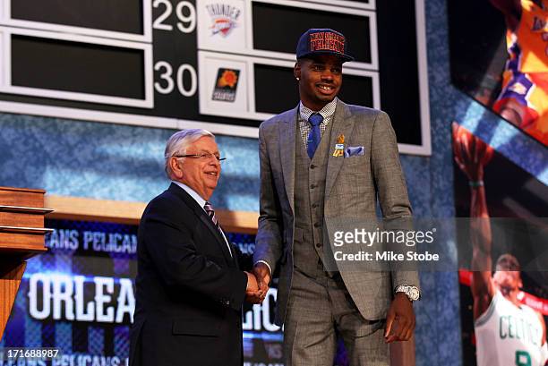 Nerlens Noel of Kentucky poses for a photo with NBA Commissioner David Stern after Zeller was drafted overall in the first round by the New Orleans...