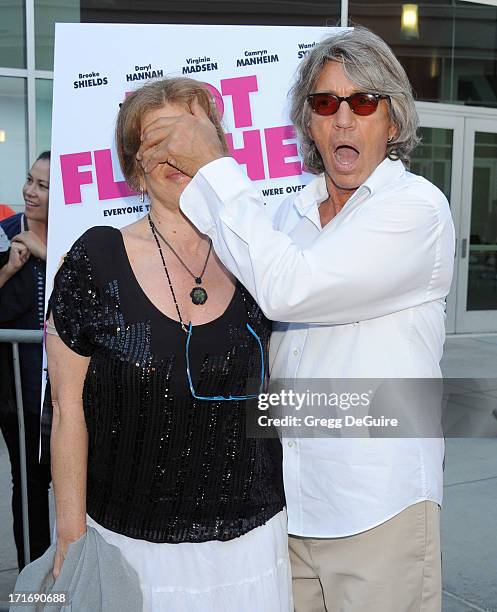 Actors Eric Roberts and wife Eliza Roberts arrive at the Los Angeles premiere of "The Hot Flashes" at ArcLight Cinemas on June 27, 2013 in Hollywood,...