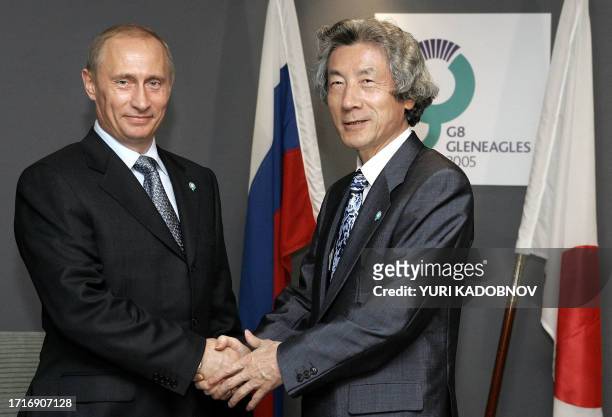 Russian President Vladimir Putin meets with Japanese Prime Minister Junichiro Koizumi during a bilateral meeting at the G8 summit in Gleneagles 07...