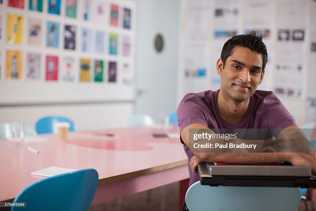 Smiling businessman in office