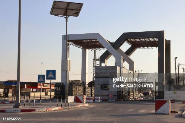 Picture taken on October 10 shows the closed gates of the Rafah border crossing with Egypt. Gaza's border crossing with Egypt, its only one that...