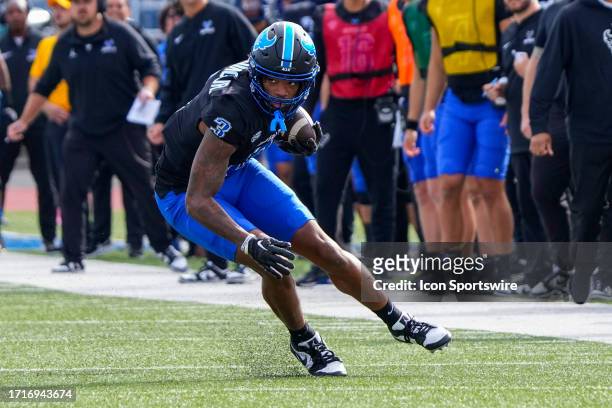 Buffalo Bulls Wide Receiver Darrell Harding Jr. Runs with the ball after making a catch during the first half of the College Football game between...