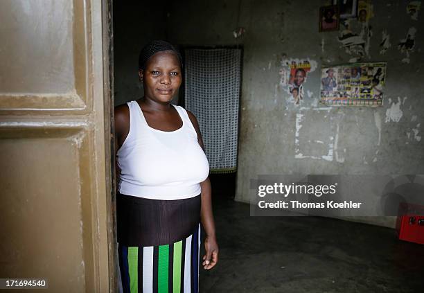 Local lady from Kabunyta, a village where a solar energy system has been constructed with German help to provide electricity to the village for the...