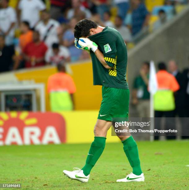 Tahiti goalkeeper Mikael Roche, who conceded 10 goals in the match, pulls his shirt over his head after the FIFA Confederations Cup Brazil 2013 Group...