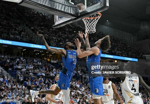 Dallas Mavericks' forward Derrick Jones Jr. Jumps to score during the NBA Preseason game between the Dallas Mavericks and Real Madrid Baloncesto at...