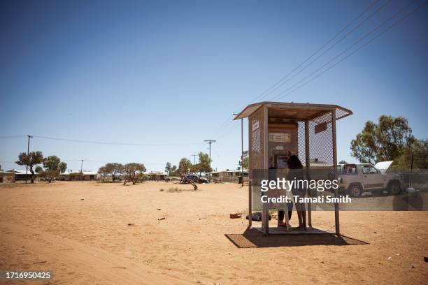 The community has no mobile reception with this phone box being the only communication outside of the community on October 04, 2023 in Pia Wadjarri,...