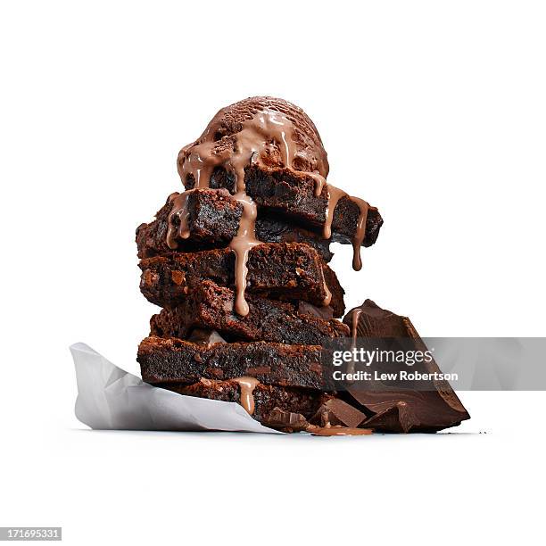 brownies with ice cream - indulgence white background stockfoto's en -beelden