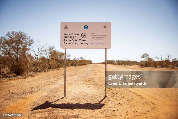 Sign asking for all radio equipment to not be used in the area. A Square Kilometer Array of radio telescopes have been built in the area as part of...