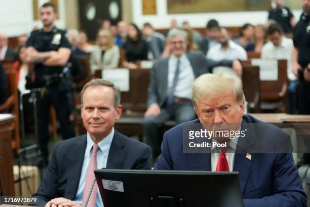 Former U.S. President Donald Trump appears in the courtroom with attorney Christopher M. Kise for the third day of his civil fraud trial at New York...