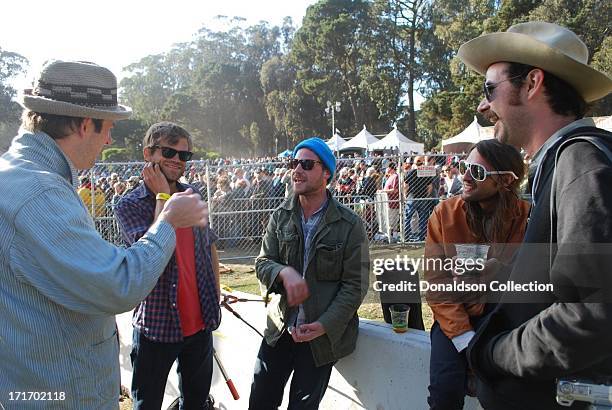 Zach Miller, Nicholas Kinsey of Elvis Perkins In Dearland, Toby Leaman, ? and Frank McElroy of the rock and roll band "Dr. Dog" backstage at the...