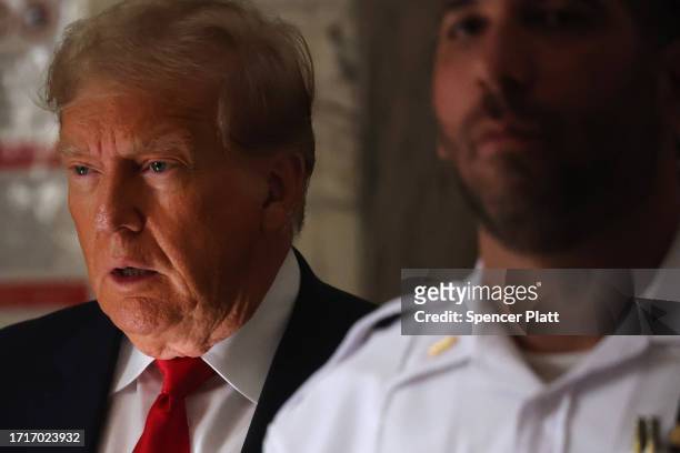Former U.S. President Donald Trump leaves the courtroom on the third day of his civil fraud trial at New York State Supreme Court on October 04, 2023...