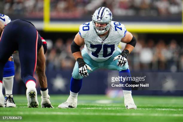 Zack Martin of the Dallas Cowboys lines up to block at AT&T Stadium on October 1, 2023 in Arlington, Texas.