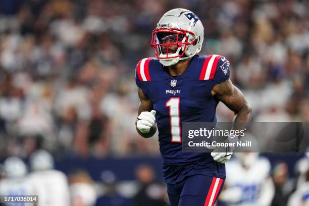 DeVante Parker of the New England Patriots runs across the field at AT&T Stadium on October 1, 2023 in Arlington, Texas.