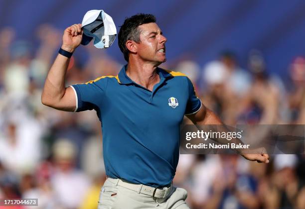 Rory McIlroy of Team Europe celebrates winning his point on the 17th green during the Sunday singles matches of the 2023 Ryder Cup at Marco Simone...