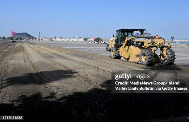 Fontana, CA Heavy machinery began the process of removing ashalt from one of the eastern parking lots adjacent to Cherry Avenue at the former Auto...