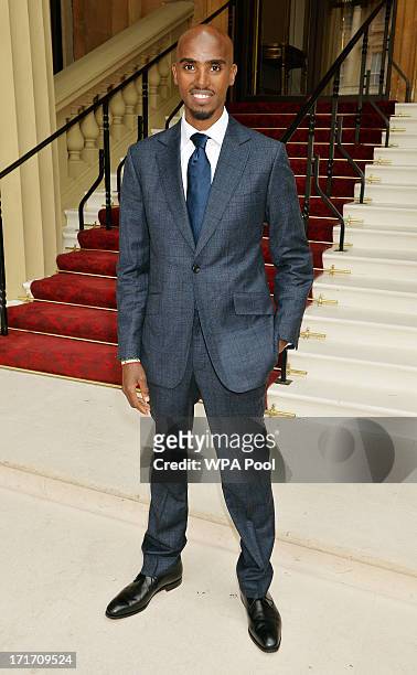 Mo Farrah, double Olympic Gold Medallist arrives for the Investiture ceremony at Buckingham Palace on June 28, 2013 in London, England. Mo Farah will...