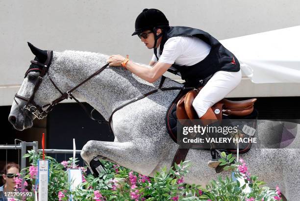 French actor and director Guillaume Canet competes on June 28, 2013 in the 2013 Monaco International Jumping, part of Global Champions Tour. AFP...