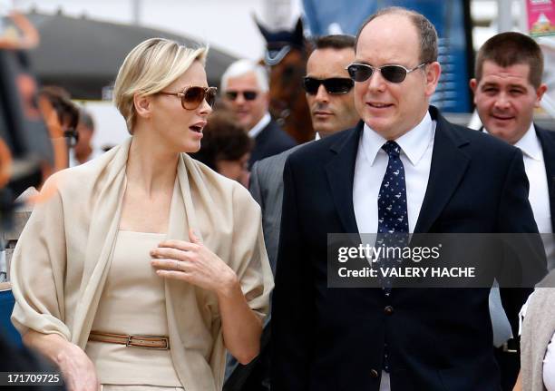 Prince's Albert II of Monaco and Princess Charlene arrive at the 2013 Monaco International Jumping as part of Global Champions Tour on June 28, 2013...