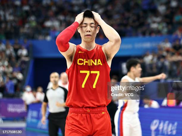 Zhang Zhenlin of Team China reacts after the Basketball - Men's Semi-final match between Philippines and China on day 11 of the 19th Asian Games at...